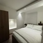 Sg *